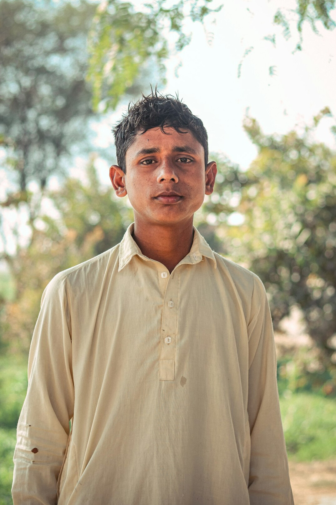 Portrait of a young man in a light shirt