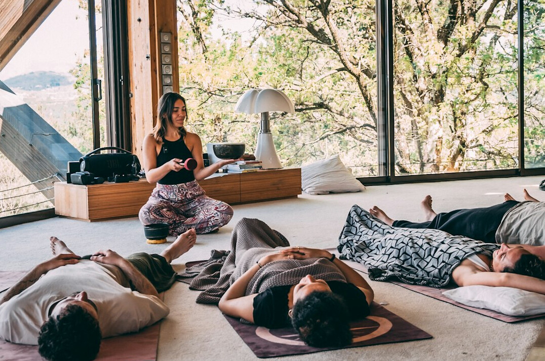 person meditating in nature