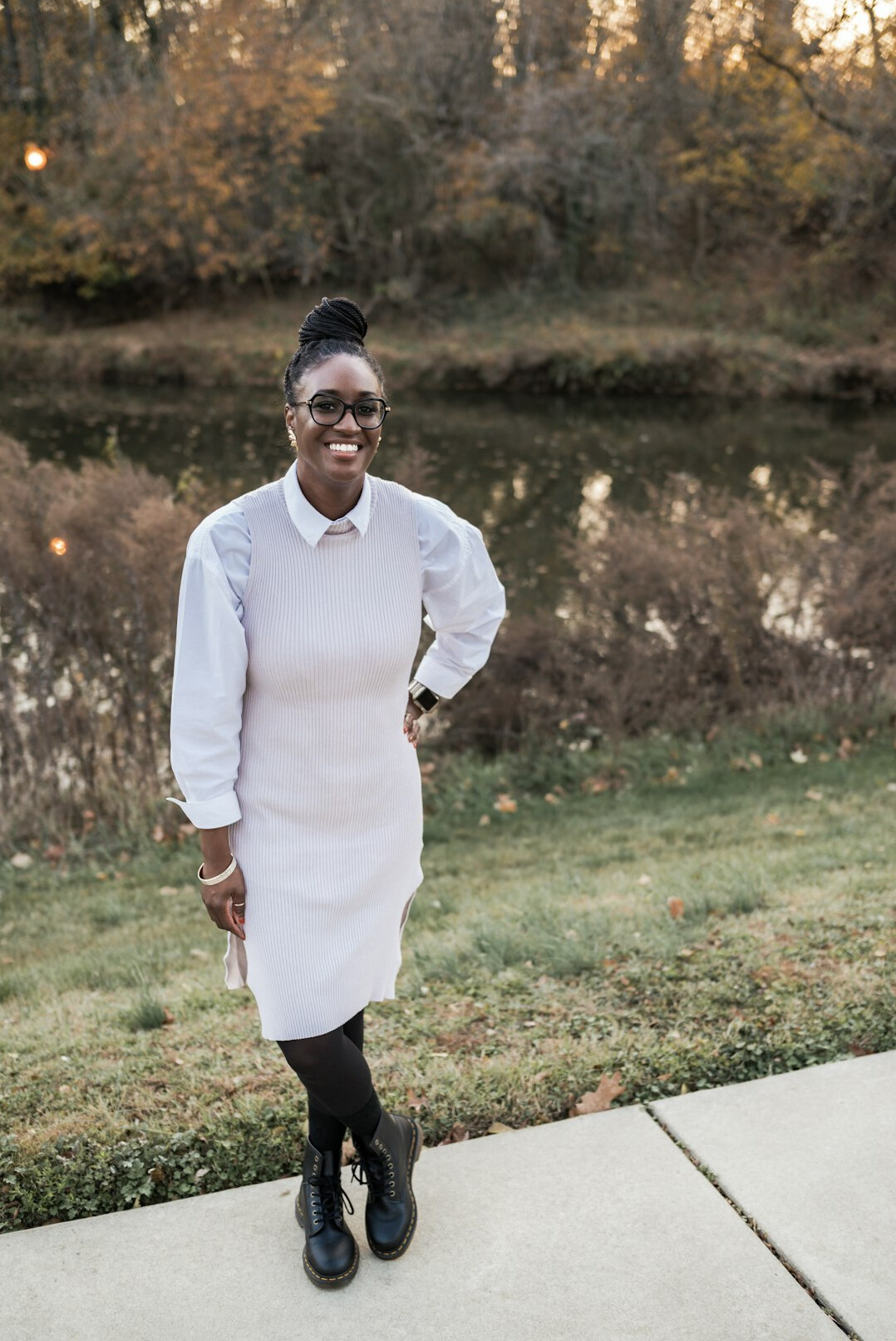 Portrait of a smiling female dietitian in a white coat